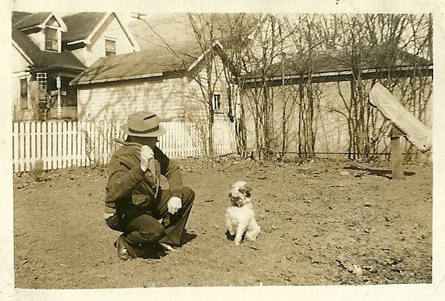 John English and his dog Sally in the backyard of a previous Madison home.